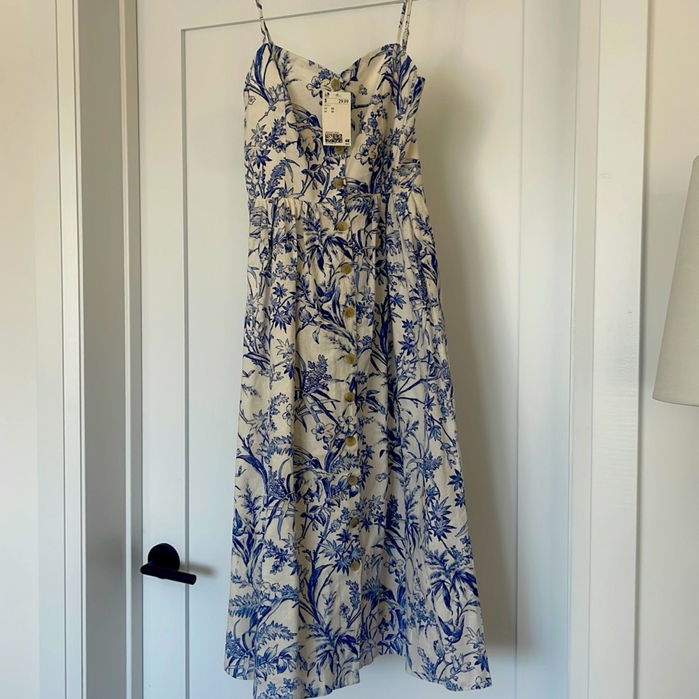 Never worn, mid length.